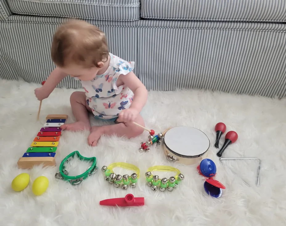 a baby playing with toys
