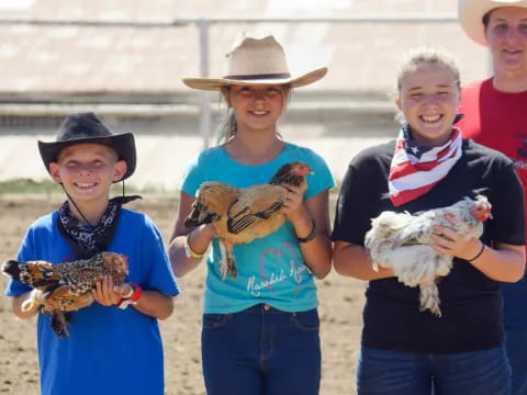 a group of people holding a bird