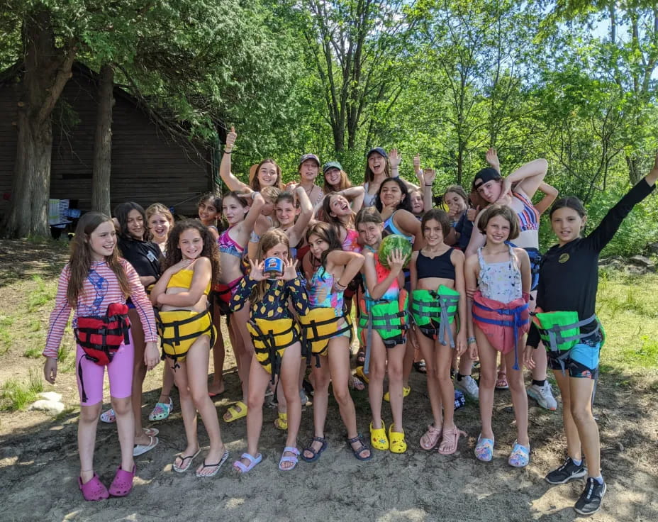 a group of girls posing for a photo
