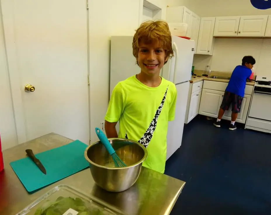 a boy in a kitchen