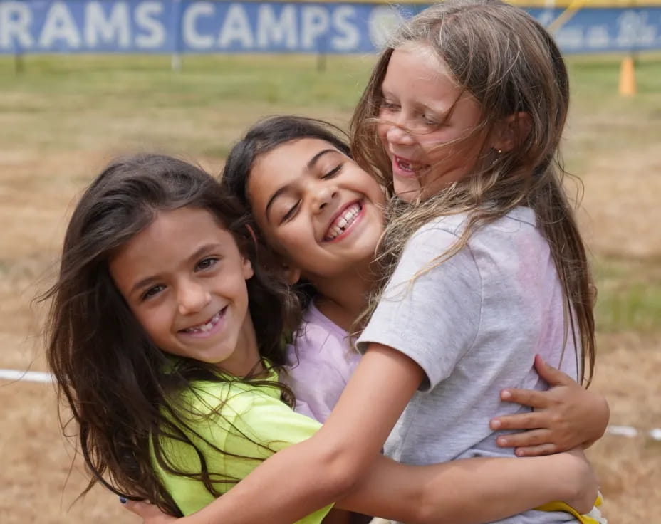 a group of girls smiling