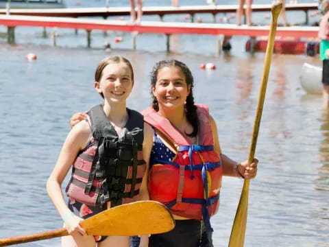 a couple of girls on a boat