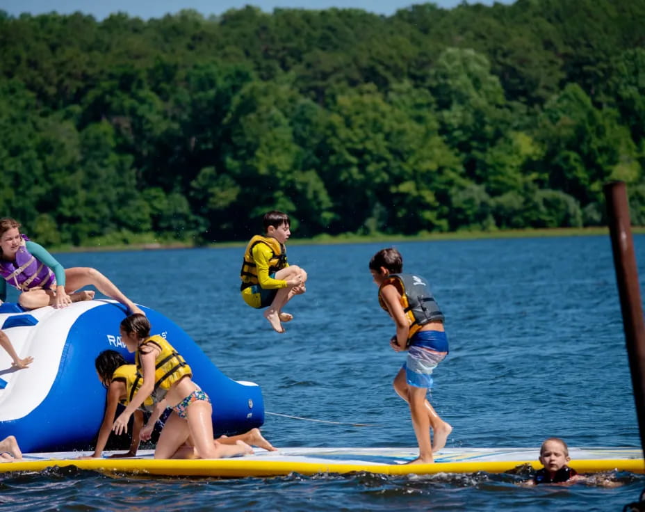 a group of people on a raft