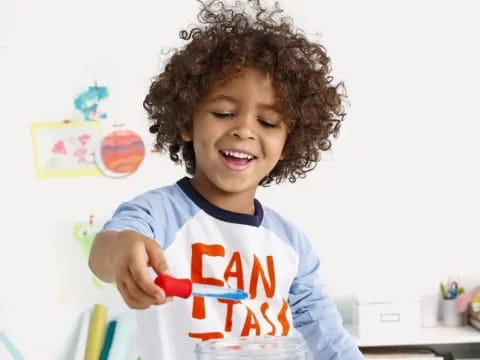 a child holding a toy