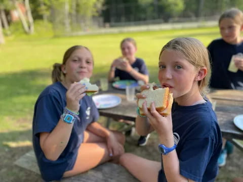 a group of people eating outside