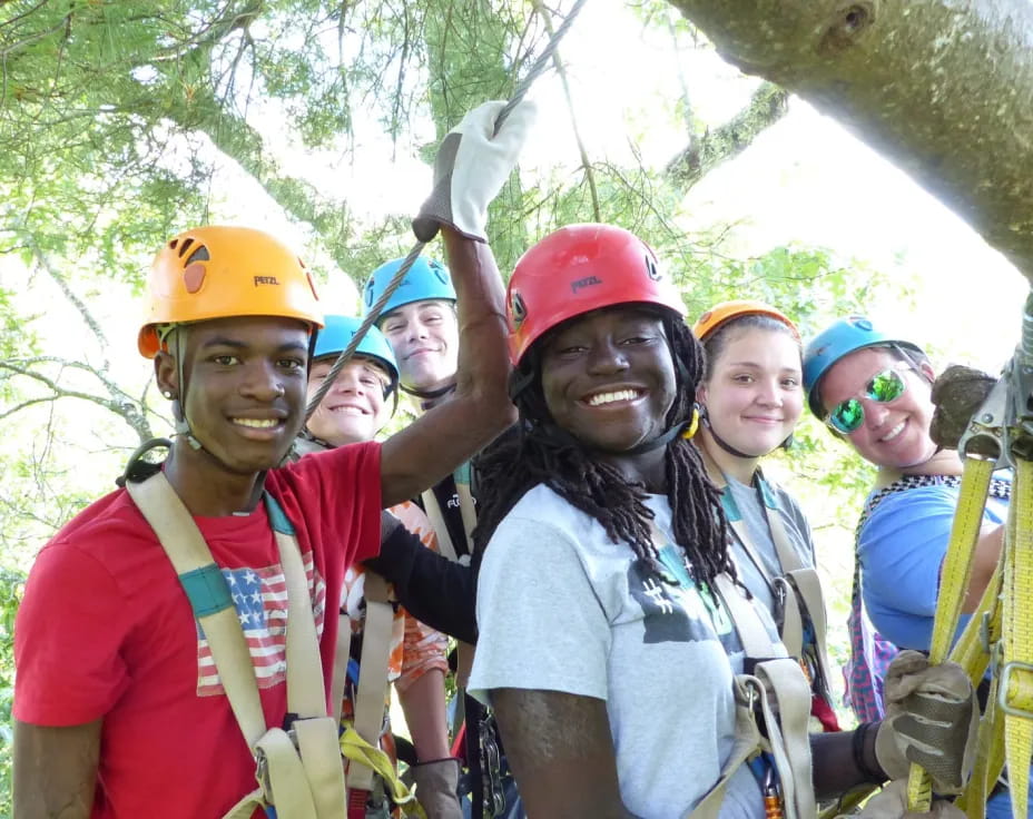 a group of people wearing helmets