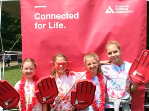 a group of girls wearing clothing