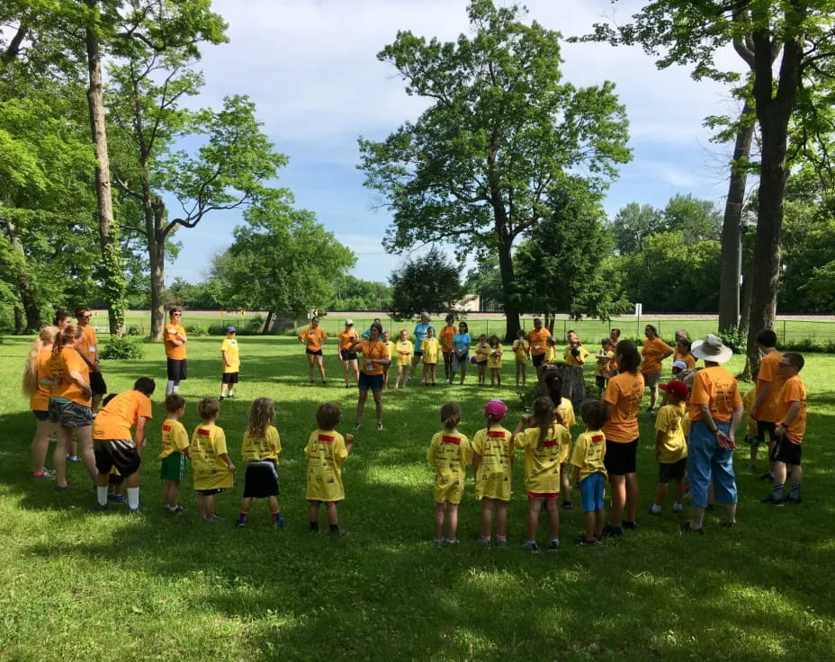 a group of children in a field