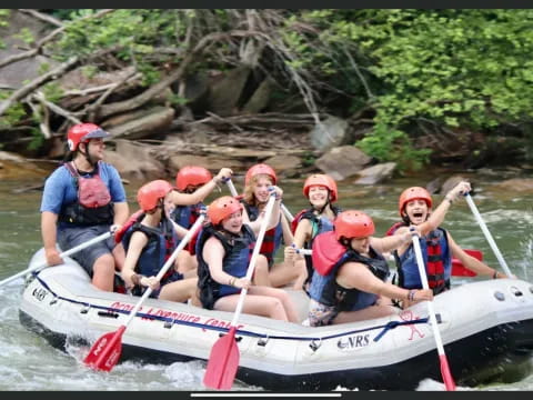 a group of people in a raft