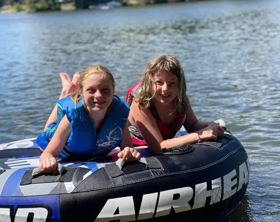 two girls in a raft
