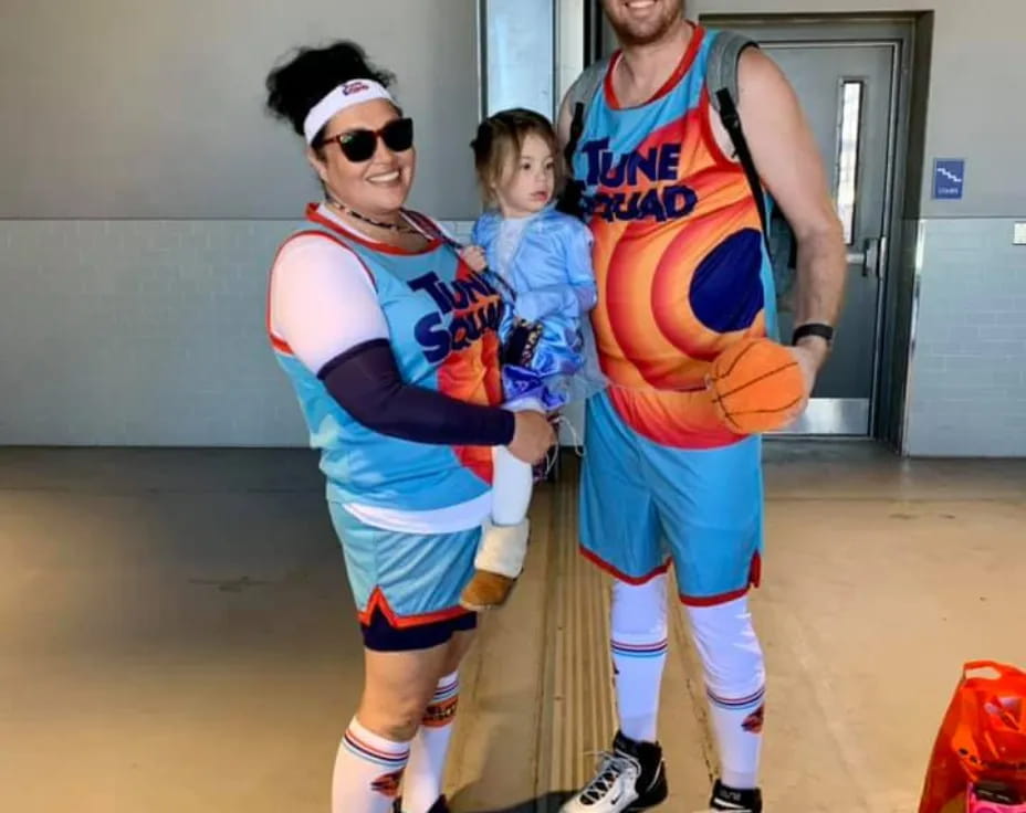 a man and woman in sports uniforms