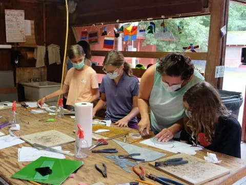 a group of people painting