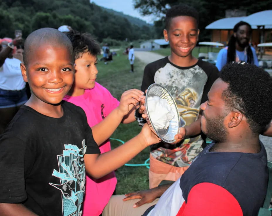 a group of people holding a trophy