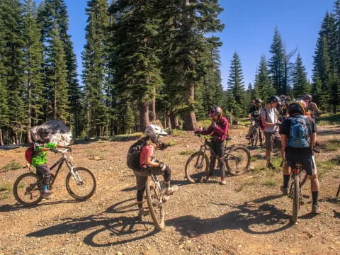a group of people riding bikes