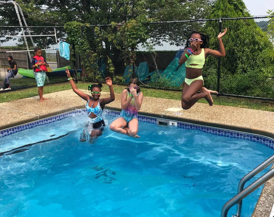 a group of people in a pool
