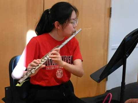 a person playing a guitar