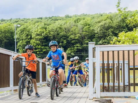 a group of kids riding bikes