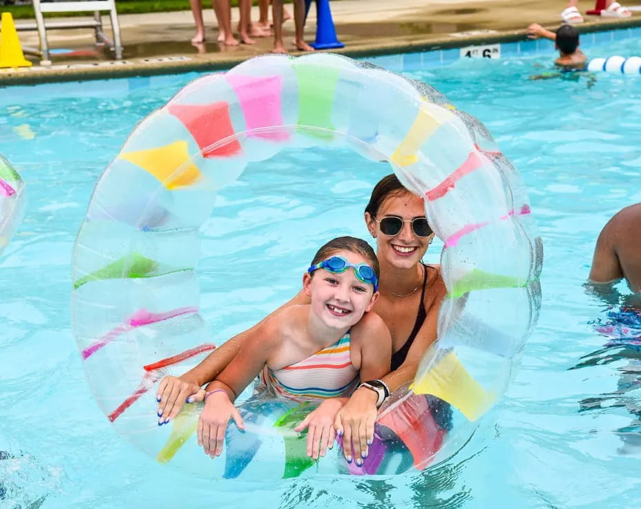 a couple of women in a pool