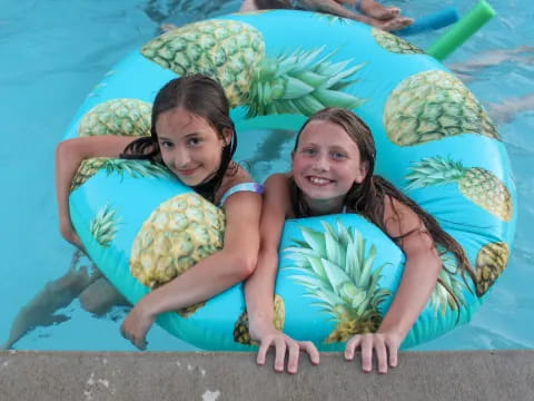 two girls in a pool