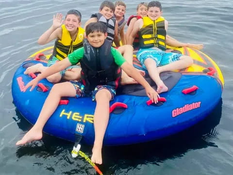 a group of people on a raft