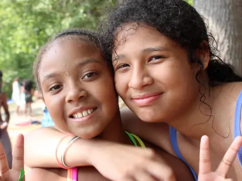 a couple of girls smiling