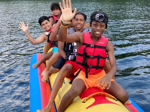 a group of people on a raft