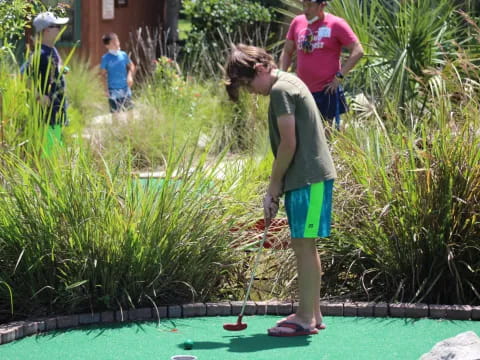 a person playing golf