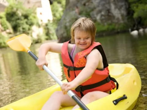 a girl in a kayak