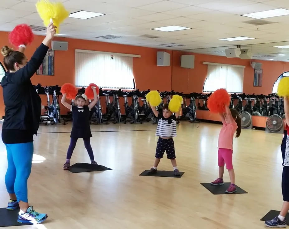 a group of kids holding balloons