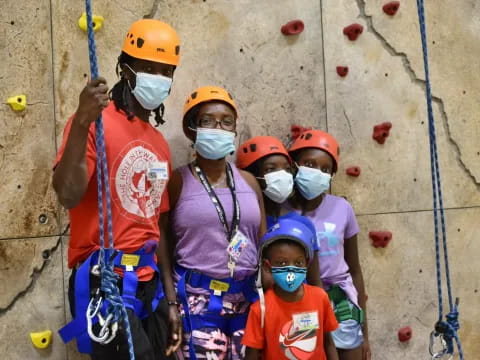 a group of people wearing helmets