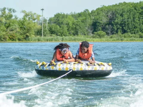 a couple of people in a canoe
