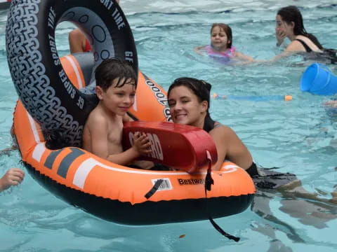a group of people in a pool