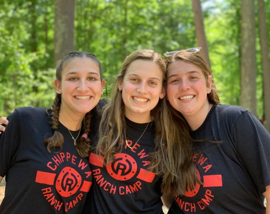 a group of women smiling