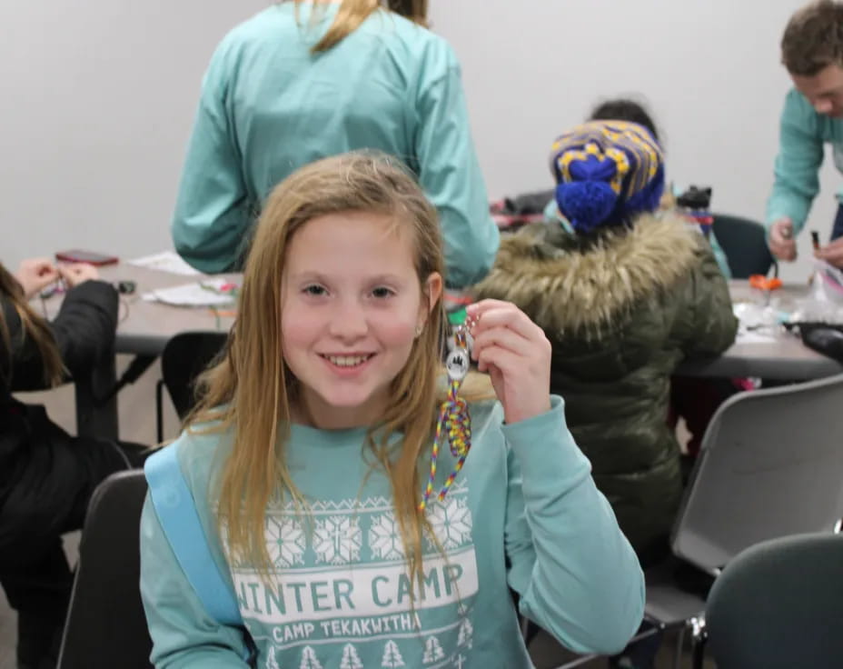 a girl with a blue shirt