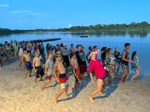 a group of people on a beach