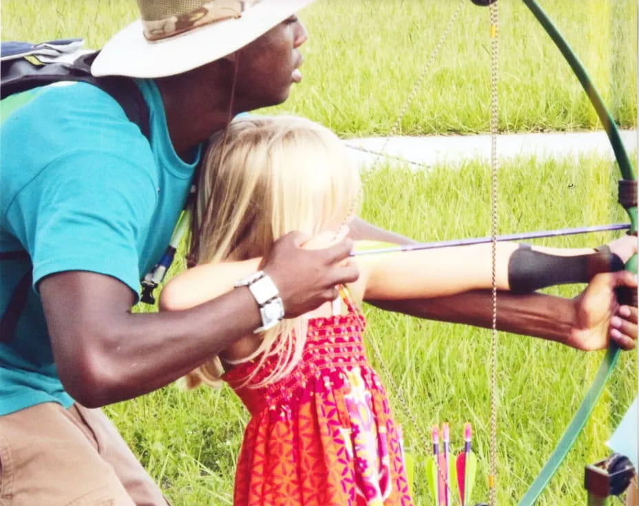 a person and a child fishing