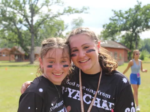 a person and a girl smiling