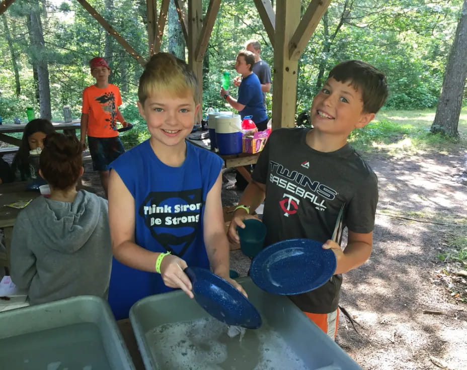 a group of kids holding frisbees