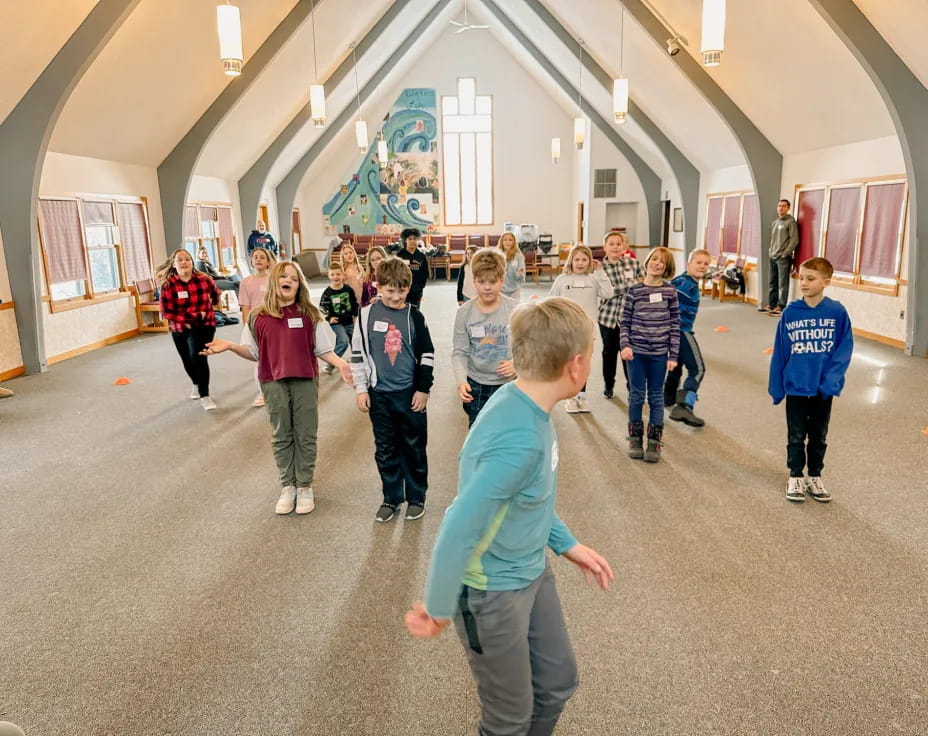 a group of children in a room