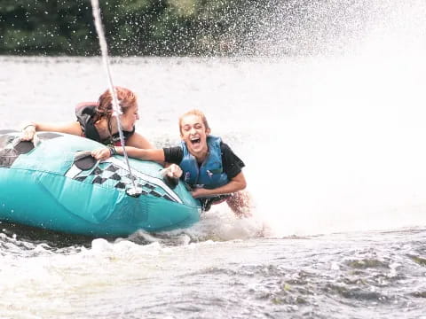 a couple of people in a raft