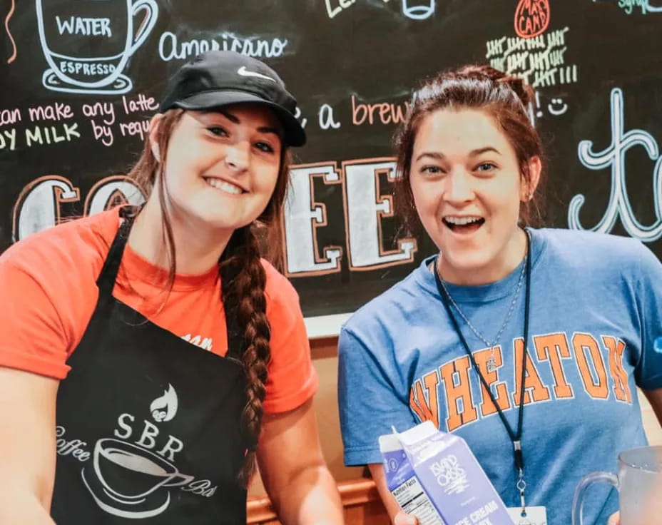 a couple of women smiling