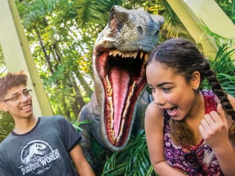 a dinosaur with a woman and a man