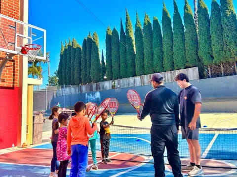 a group of people holding hoops