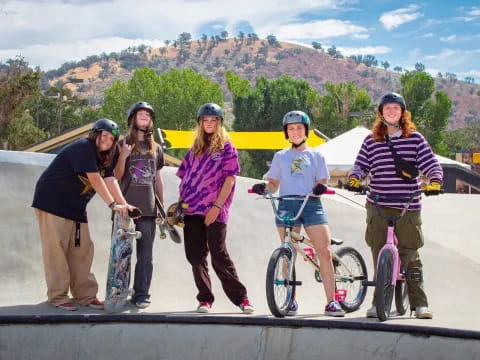 a group of people with bicycles