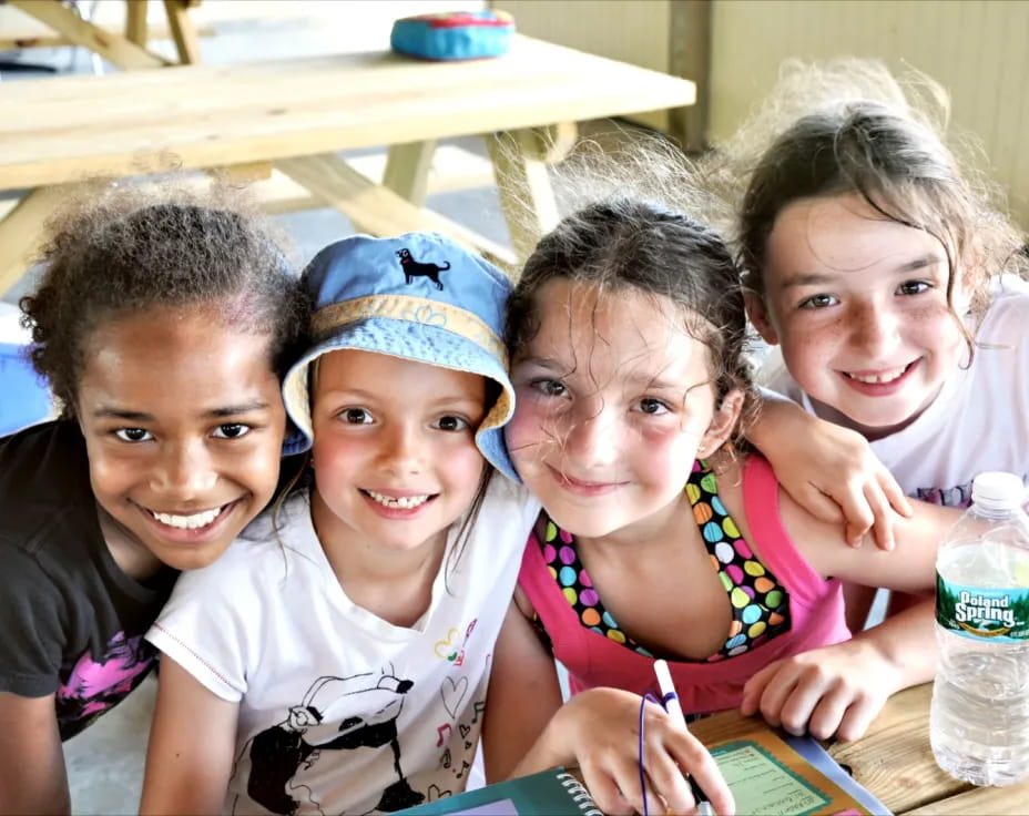 a group of children smiling