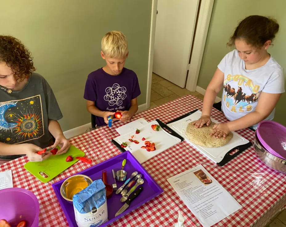 a group of kids painting