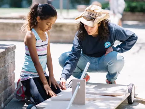 a person and a girl painting