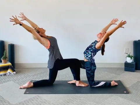 a group of people doing yoga
