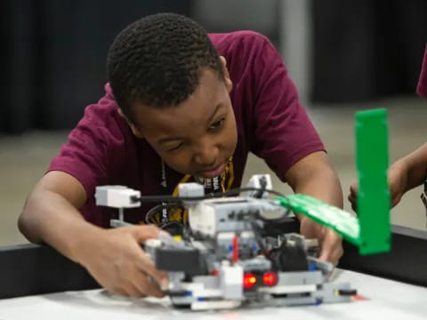 a man working on a circuit board
