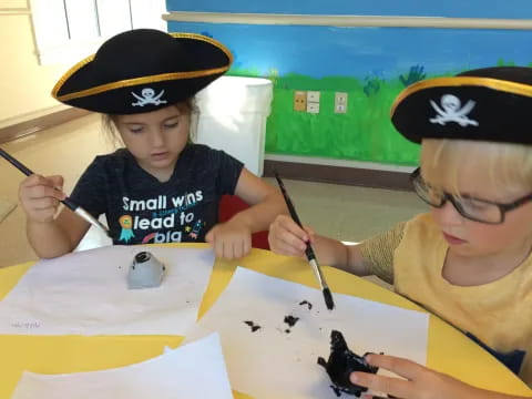 a couple of kids painting